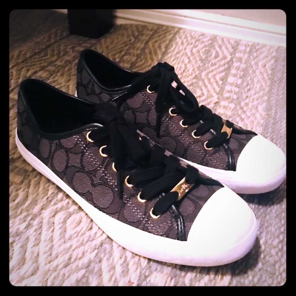 Black Coach Sneakers with Gold Hardware.